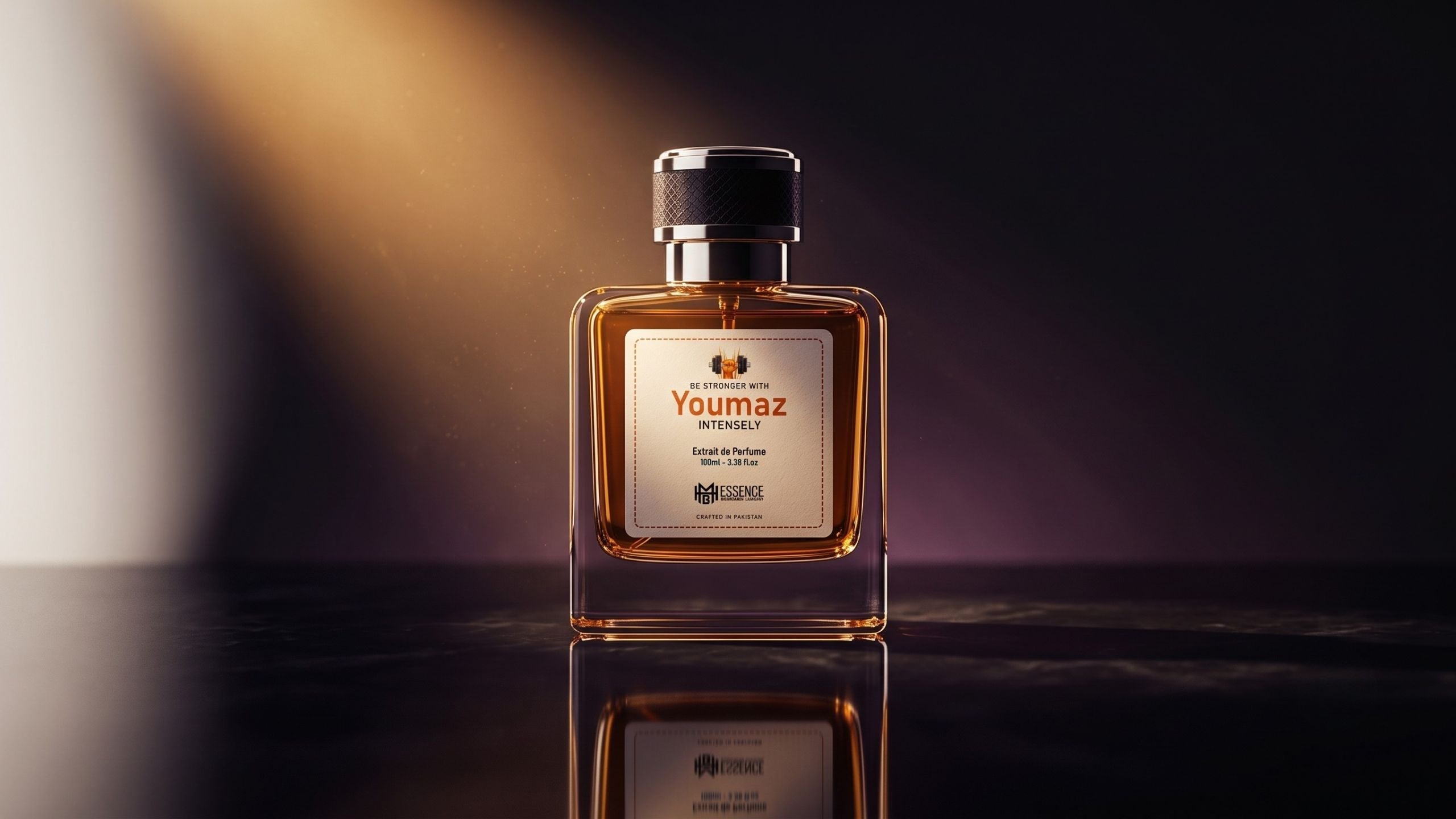 Luxury MHB Essence perfume bottle on dark stone — honest designer-inspired perfume in Pakistan