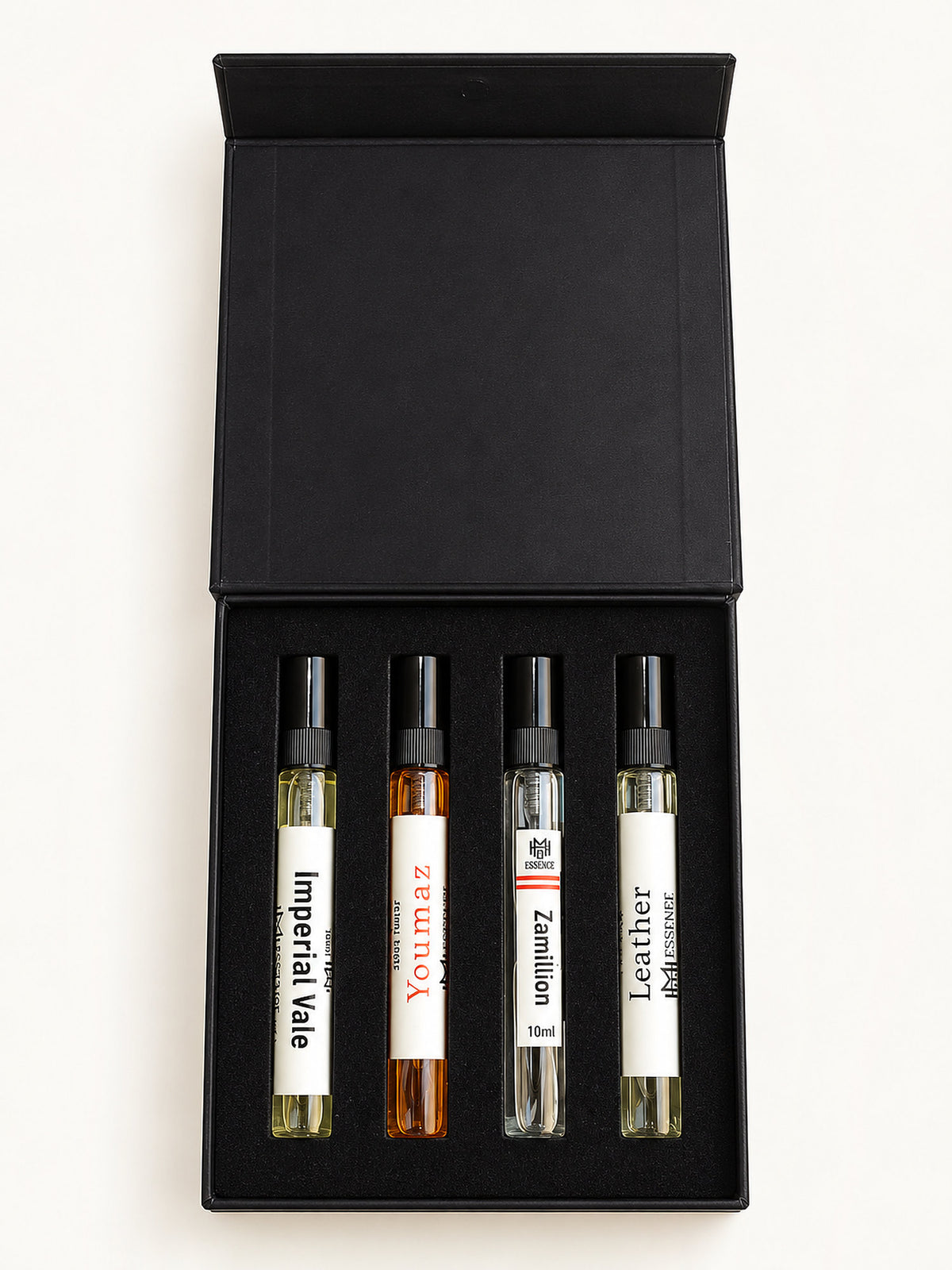 MHB Essence Discovery Kit — four 10ml Extrait de Parfum (Imperial, Youmaz, Zamillion, Leather) in the black gift box